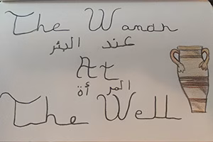"The Woman at the Well" written in both English and Arabic.